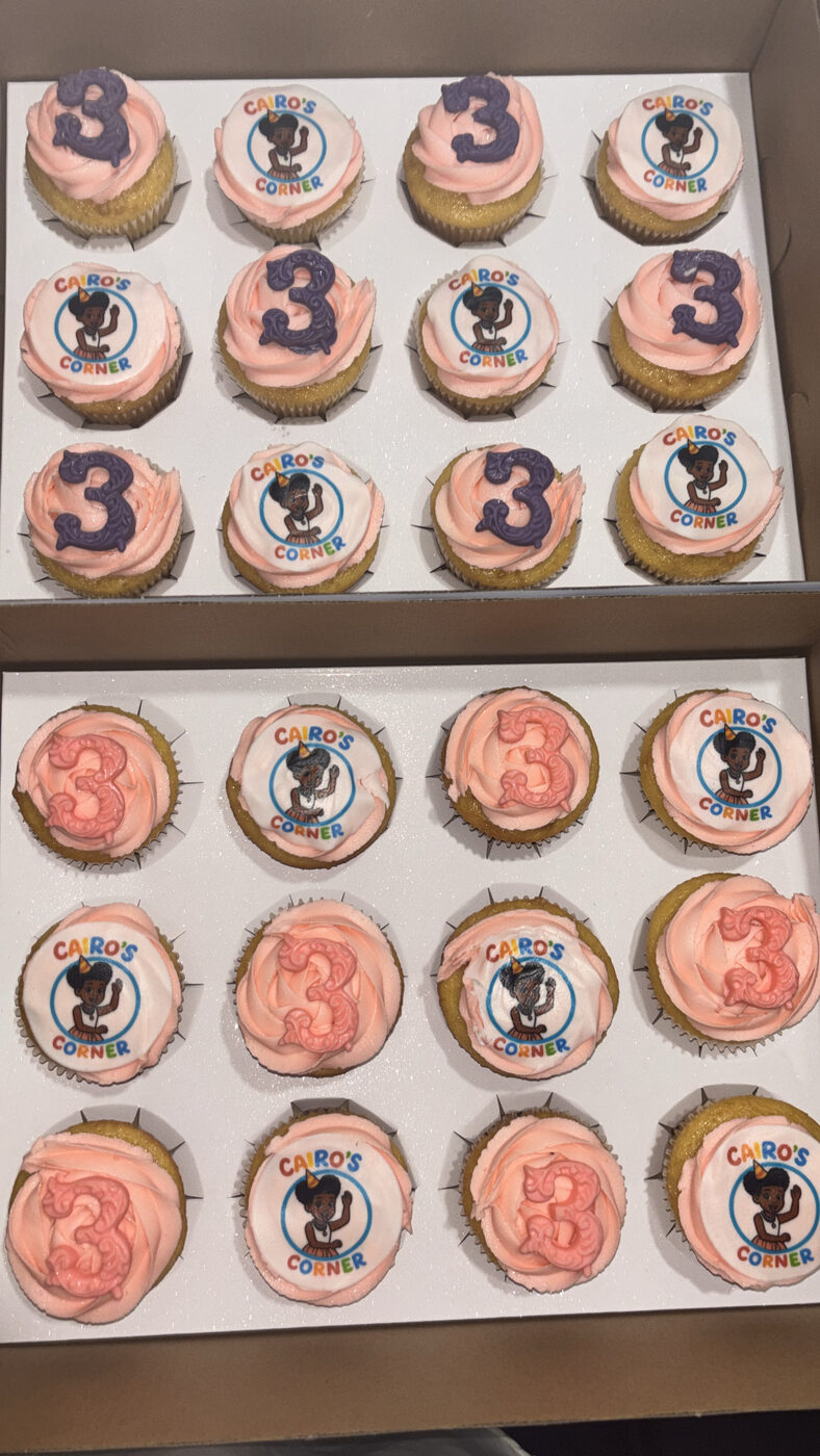 Custom themed birthday cupcakes with pink frosting and gold accents